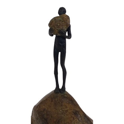 Bronze Figure On Rock High